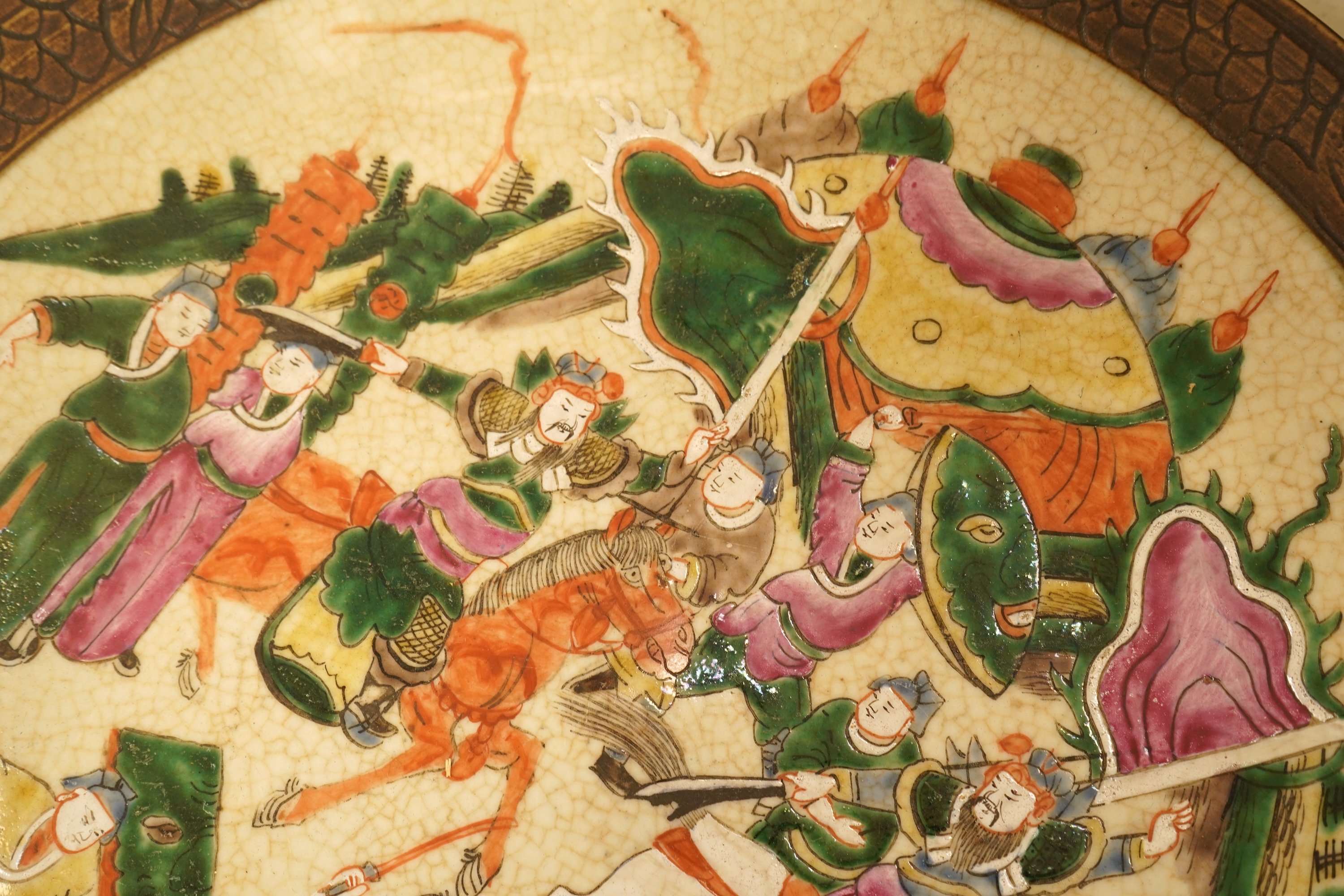 A late 19th/early 20th century Chinese famille rose crackleware charger/dish, 40cm diameter.